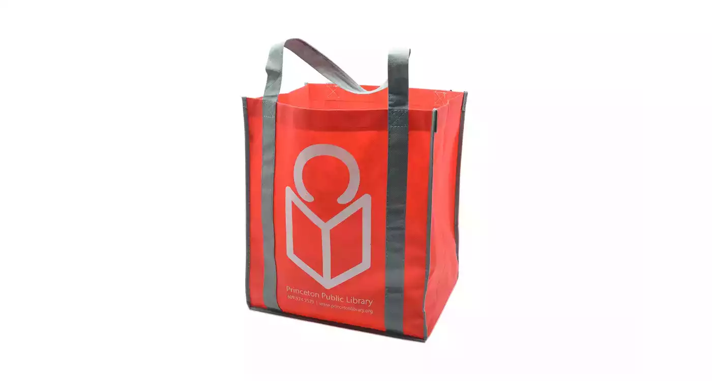 Red tote bag with library logo