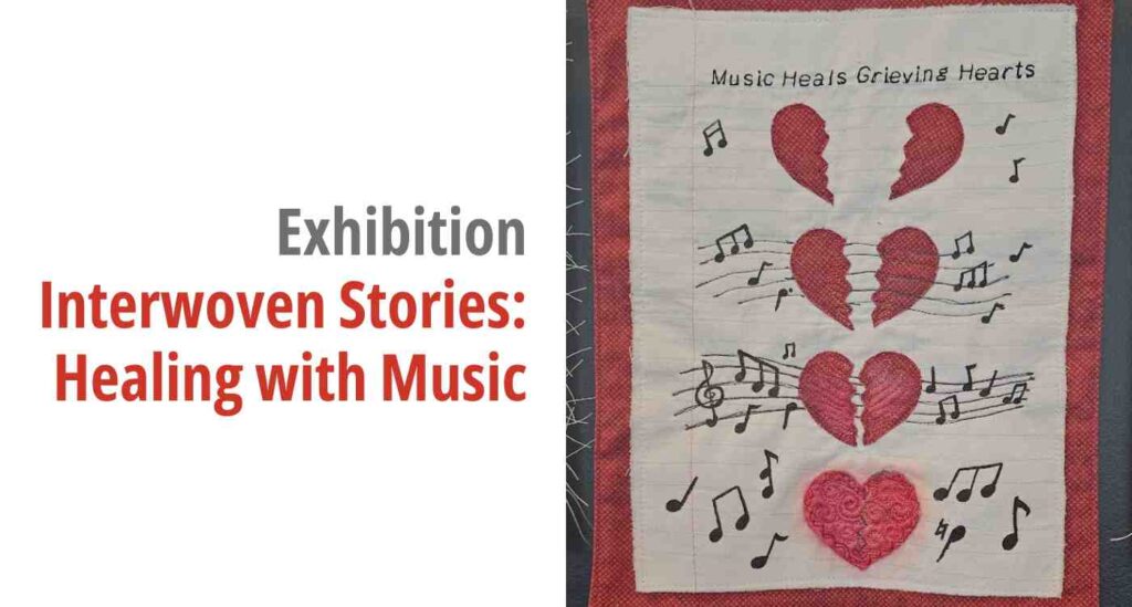 An image of one of the embroiderer's work on a slide with the words "Exhibition, Interwoven Stories: Healing with Music"