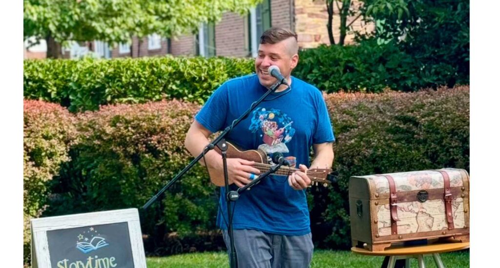 Storytime Jeff playing the ukulele