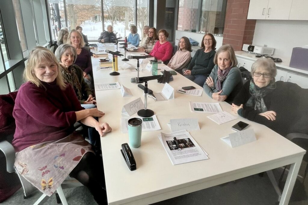 Library book group members sitting around a table.